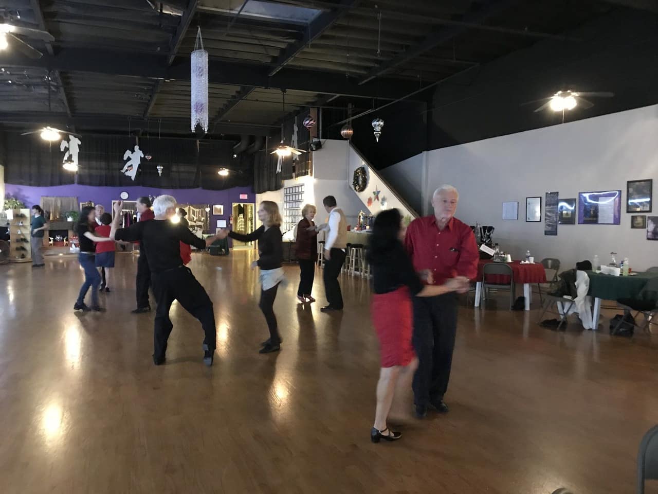 Couples social dancing on the House of Dance studio floor